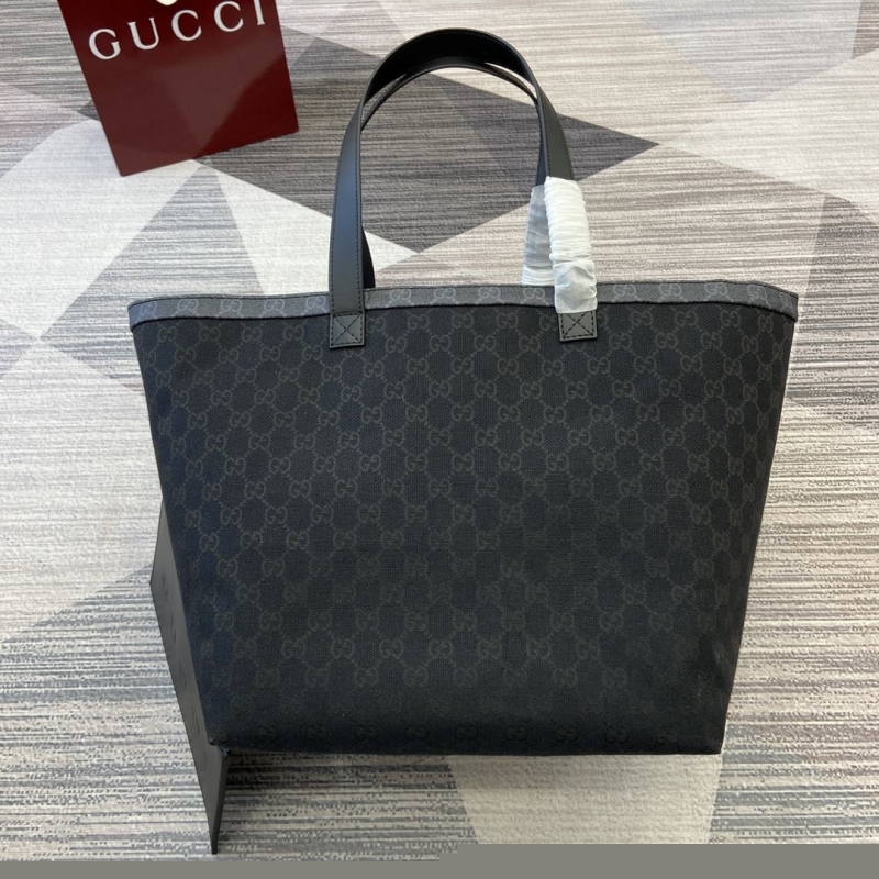 G*u*i shopping bags
